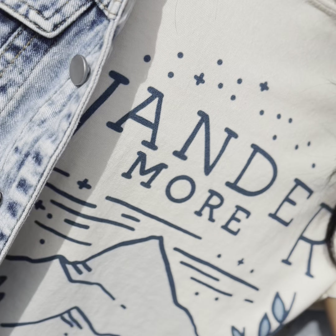 video of model wearing wander more tee