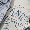 video of model wearing wander more tee
